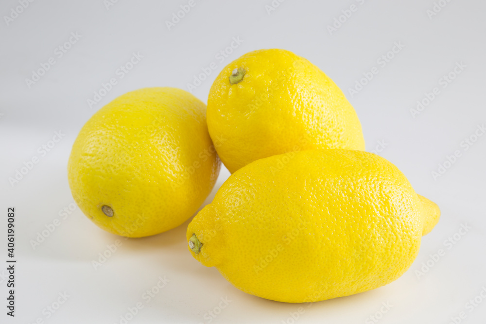 Lemons are yellow on a white background. Citrus fruits. Lemons are yellow on a white background. Citrus fruits.