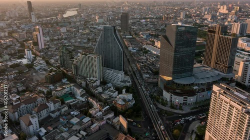 Bangkok business district city center above Samyan area and traffic, with buildings and skyscrapers, day to night; zoom out – Time Lapse photo