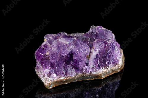 macro mineral stone Amethysts on a black background
