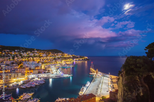 Fototapeta Naklejka Na Ścianę i Meble -  Awe landscape with entrance to harbor of Nice ( Rade de Villefranche)  - blue twilights