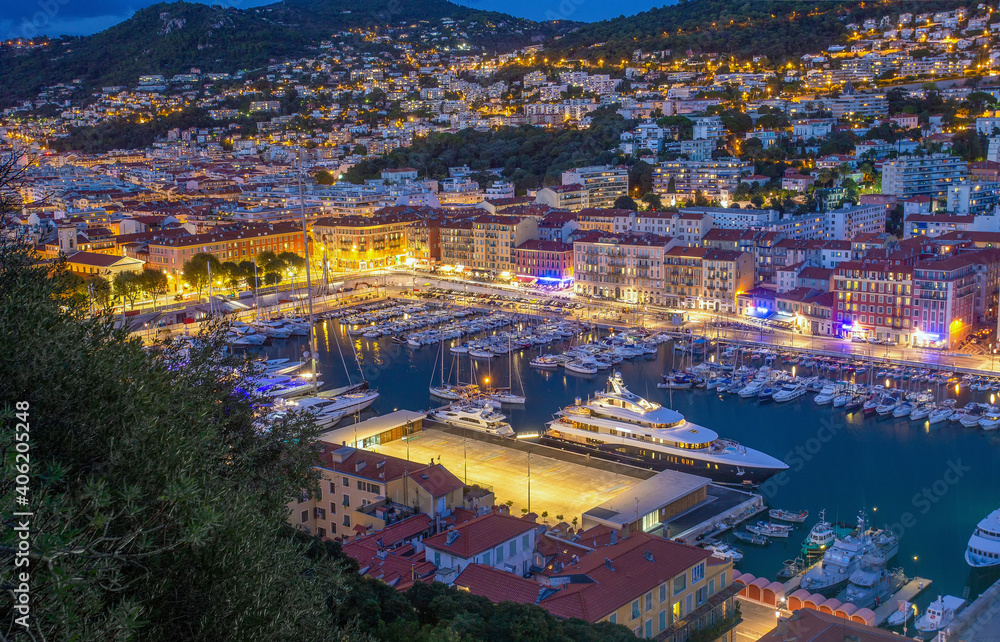 Idyllic view oа entrance to  harbor - Rade de Villefranche  in Nice -  night scene with illumination