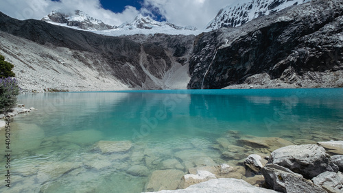 Fototapeta Naklejka Na Ścianę i Meble -  Lagoon 69 vibrant blue waters with Chakrarahu.peak, Peru.