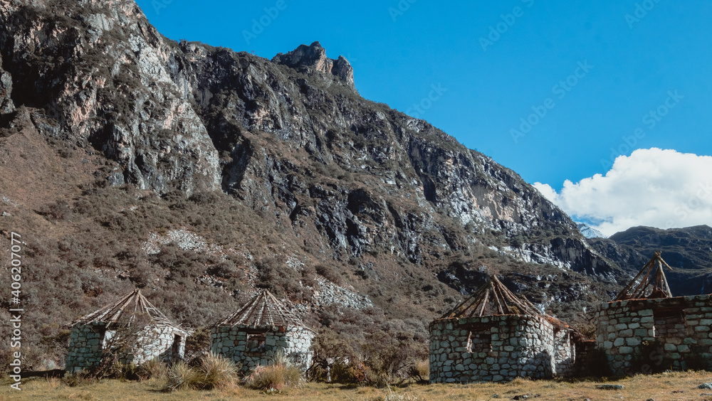 Abandoned stone houses along the trail to Lagoon 69, Peru. Abandoned stone houses along the trail to Lagoon 69, Peru.