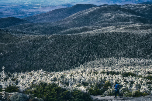 Konstfotografi Hiker walking on a beautiful mountain path to the top of Mount Marcy, Adirondack