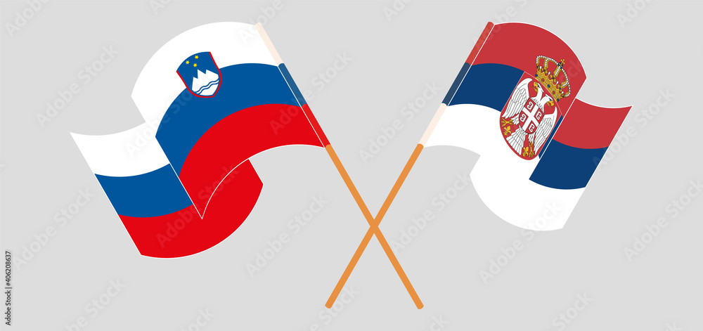 Crossed and waving flags of Slovenia and Serbia Crossed and waving flags of Slovenia and Serbia