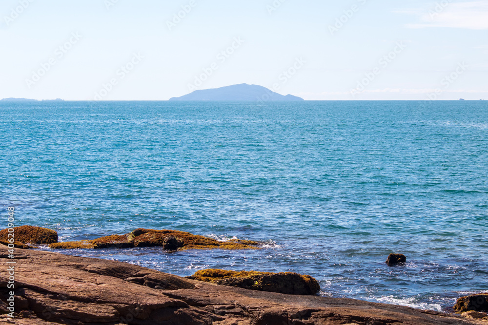 sea and rocks located at Quatro Ilhas Beach, Bombinhas, Santa Catarina, Brazil sea and rocks located at Quatro Ilhas Beach, Bombinhas, Santa Catarina, Brazil