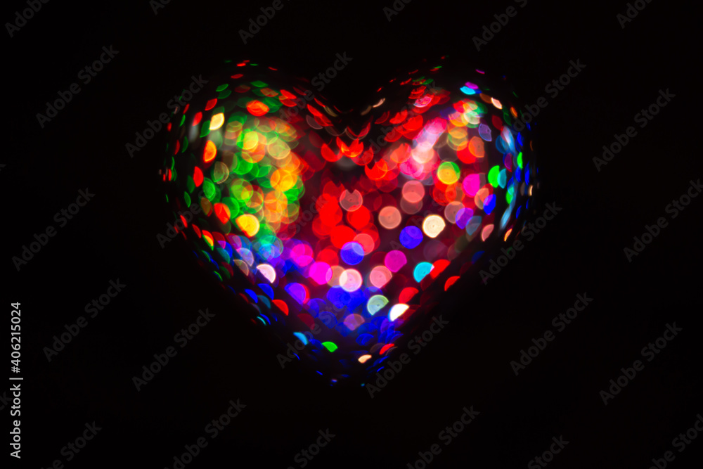 Beautiful heart made of Color Bokeh on a dark background for use in graphic design Beautiful heart made of Color Bokeh on a dark background for use in graphic design