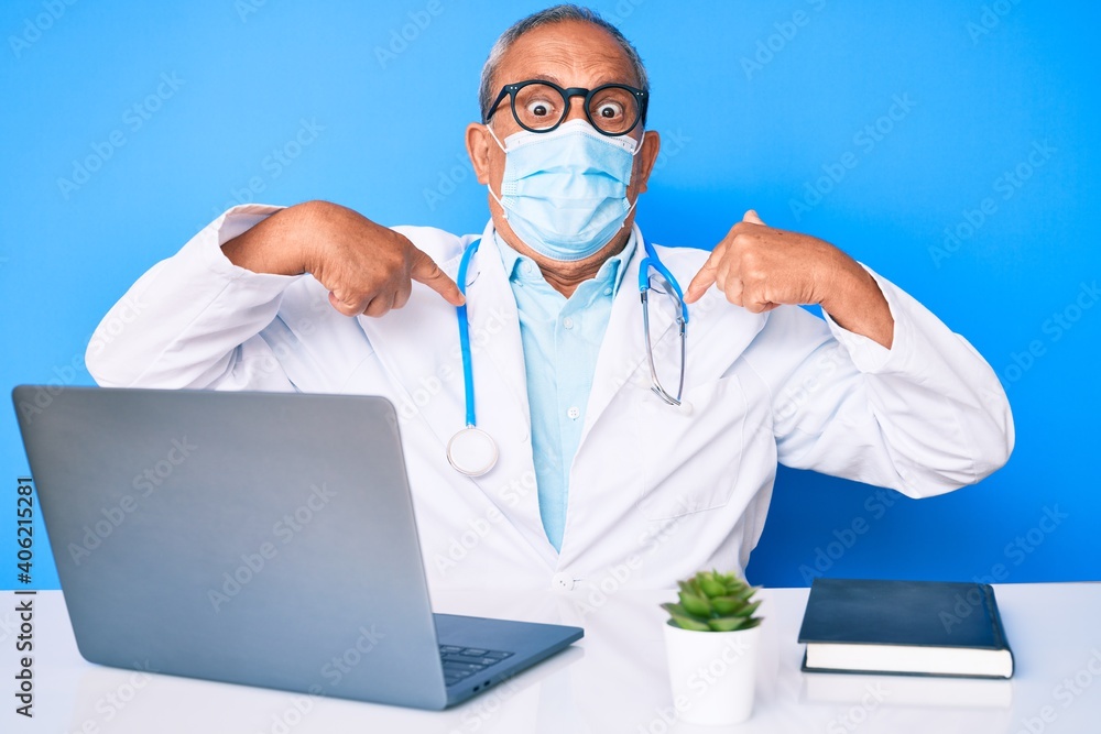 Senior handsome man with gray hair wearing doctor uniform and medical mask looking confident with smile on face, pointing oneself with fingers proud and happy. Senior handsome man with gray hair wearing doctor uniform and medical mask looking confident with smile on face, pointing oneself with fingers proud and happy.