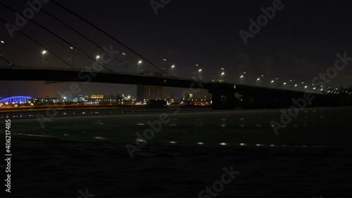 Night winter urban lansdcape. Bridge night traffic.