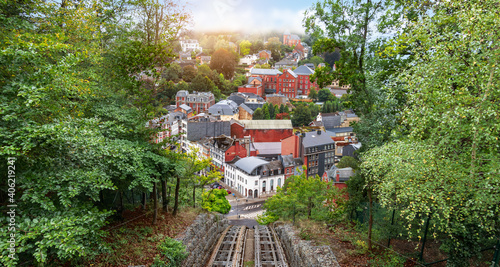 Cityscape of Spa in Belgium. View from up hill with cable car rail.