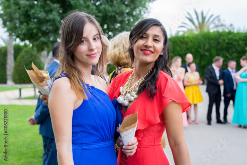 two young women invited to a wedding