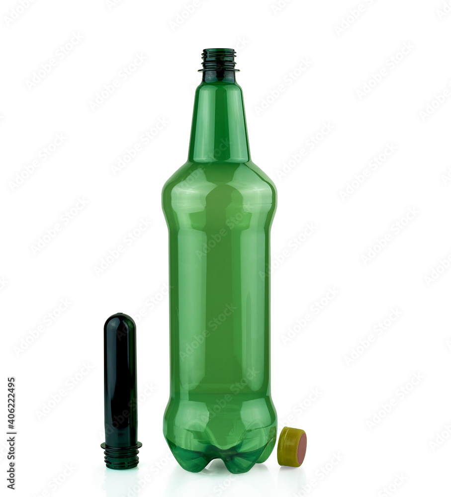 Plastic bottle and PET preform on white background. Green plastic bottle and PET preform for its manufacture Plastic bottle and PET preform on white background. Green plastic bottle and PET preform for its manufacture
