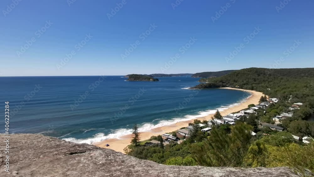 Beautiful view of a deep blue sea with white sandy beach, small island and deep blue sky in the background, Mount Ettalong Lookout, Pearl Beach, Brisbane Water National Park, New South Wales, Australi Beautiful view of a deep blue sea with white sandy beach, small island and deep blue sky in the background, Mount Ettalong Lookout, Pearl Beach, Brisbane Water National Park, New South Wales, Australi