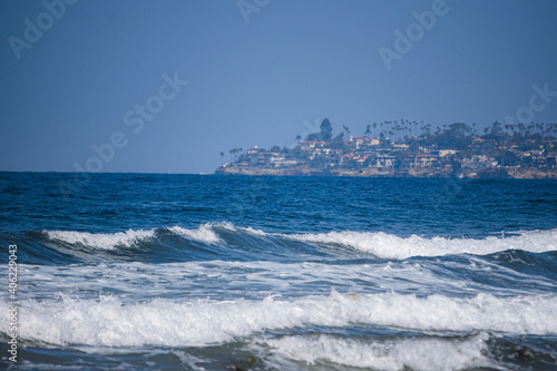 Ocean with city in the background