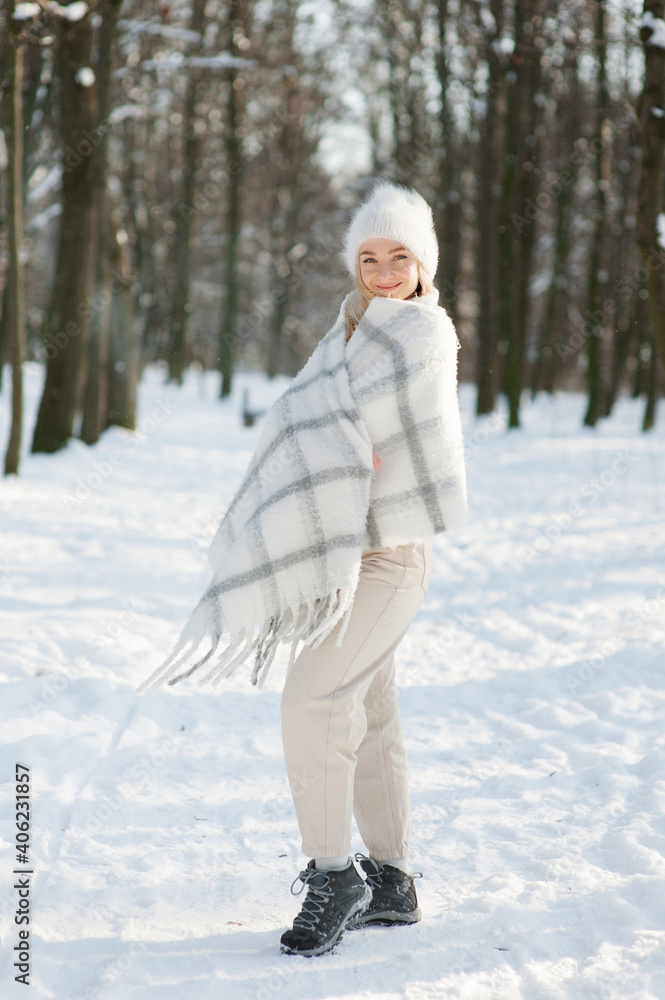 Cute young woman portrait, winter outdoor relaxation Cute young woman portrait, winter outdoor relaxation