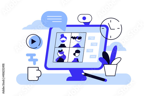 Desktop computer with group of colleagues taking part in video conference.