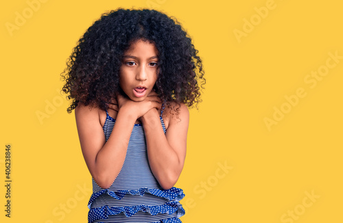 African american child with curly hair wearing swimwear shouting and suffocate because painful strangle. health problem. asphyxiate and suicide concept.