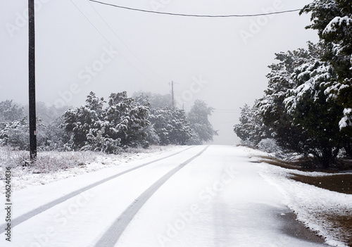 snow covered road © Adam