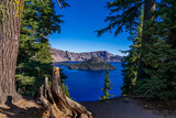 This is Crater Lake National Park in Oregon. The water of this extremely deep lake appears blue-purple.