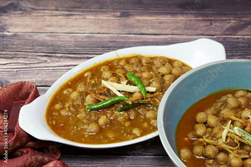 Top down view of a bowl of spicy and tangy Amritsari Chole