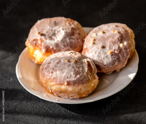 sweet donuts on a white plate
