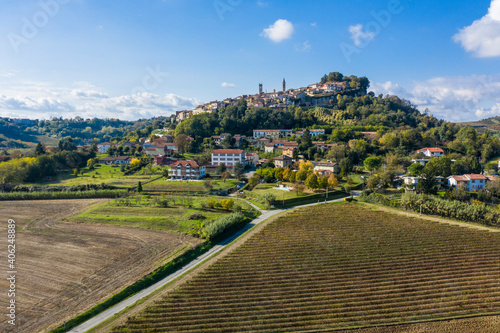 Aerial view of the town of Rosignano Monferrato, Piedmont, Italy. Monferrato and Langhe area, cultivated fields and typical ancient town on top of a hill