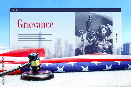 Grievance. Judge gavel and america flag in front of New York Skyline. Web Browser interface with text and lady justice.