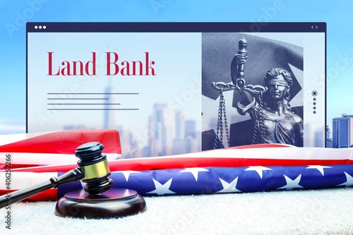 Land Bank. Judge gavel and america flag in front of New York Skyline. Web Browser interface with text and lady justice. photo