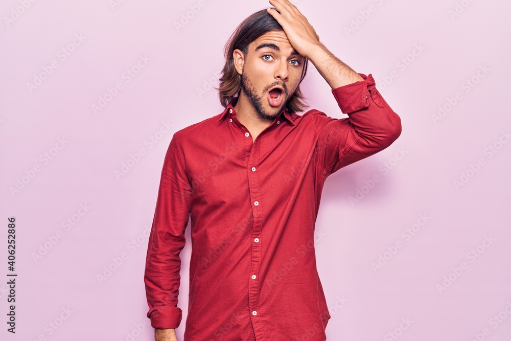 Young handsome man wearing business clothes surprised with hand on head for mistake, remember error. forgot, bad memory concept. Young handsome man wearing business clothes surprised with hand on head for mistake, remember error. forgot, bad memory concept.