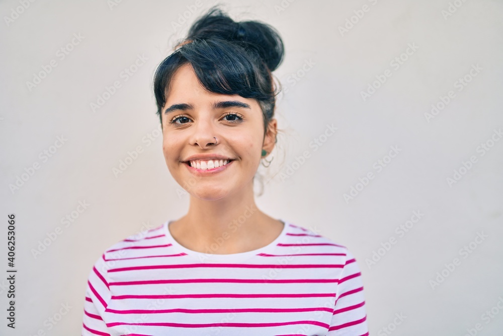 Young hispanic girl smiling happy walking at the city. Young hispanic girl smiling happy walking at the city.