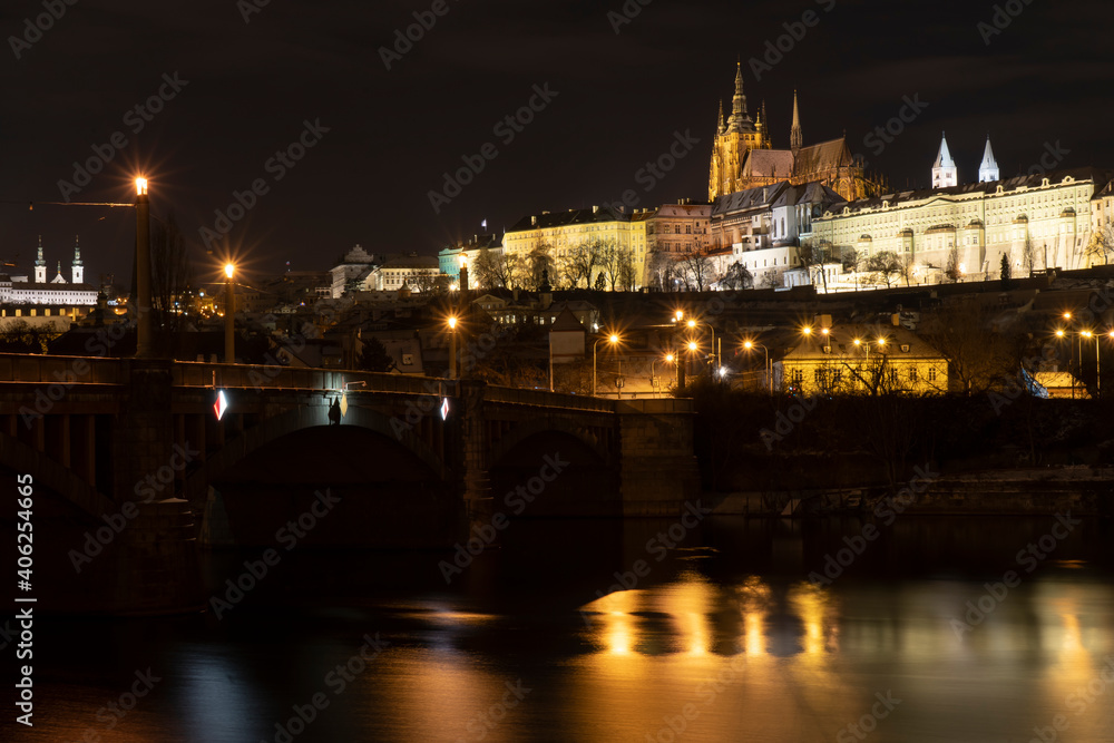 .Prague Castle and the Church of St. Vitus in the center of Prague and the light from street lighting