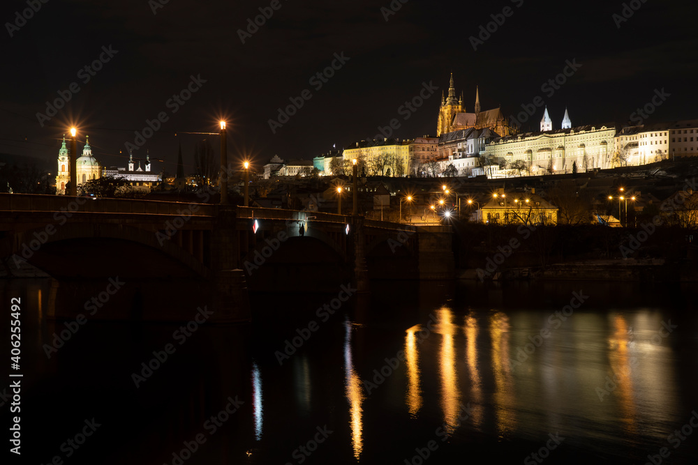 .Prague Castle and the Church of St. Vitus in the center of Prague and the light from street lighting