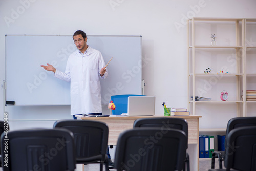 Young male doctor giving seminar in the classroom © Elnur