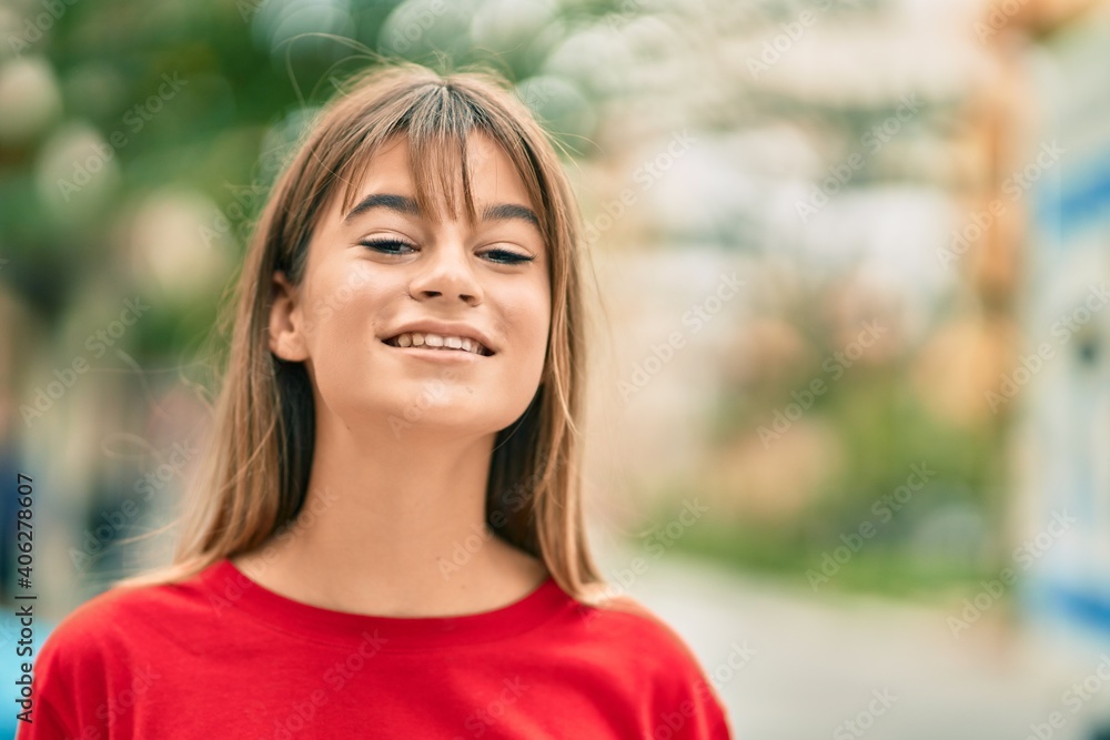 Caucasian teenager girl smiling happy standing at the city. Caucasian teenager girl smiling happy standing at the city.