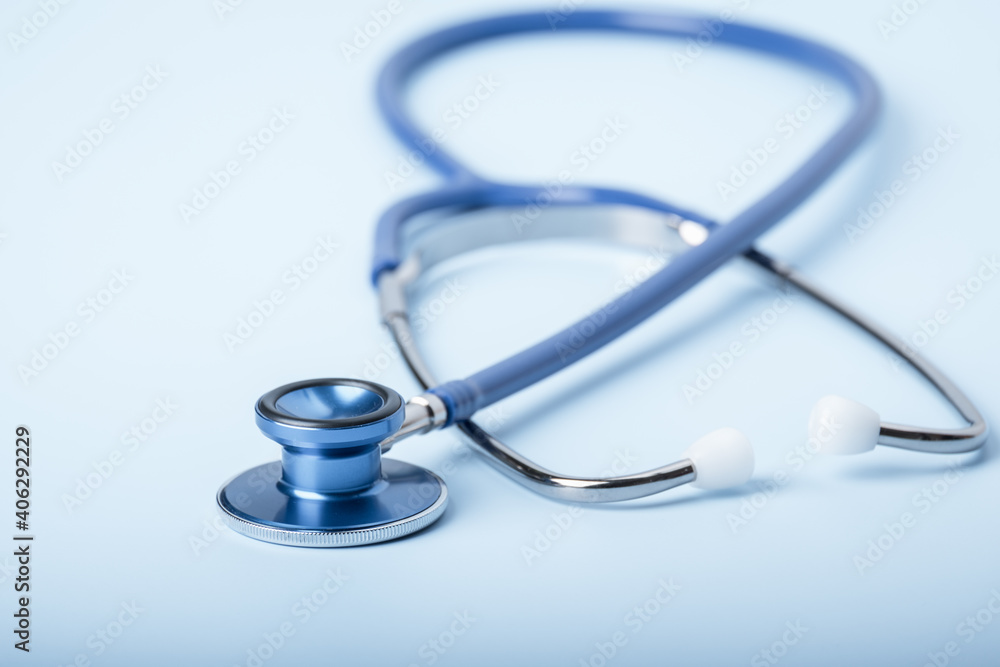 Stethoscope on blue background, Healthcare. Stethoscope on blue background, Healthcare.