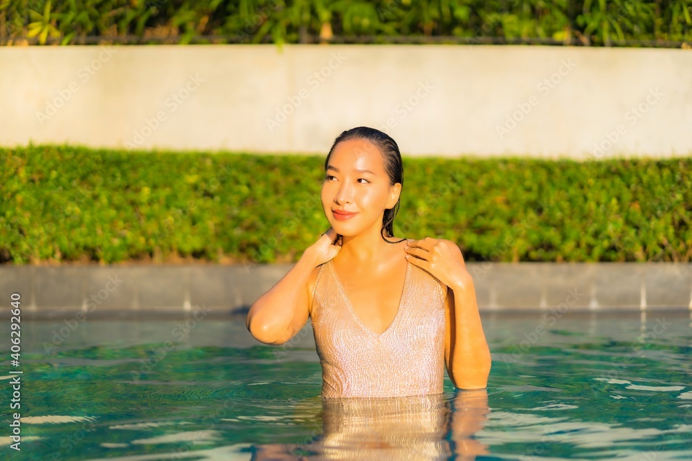 Portrait beautiful young asian woman relax smile leisure on vacation around swimming pool Portrait beautiful young asian woman relax smile leisure on vacation around swimming pool