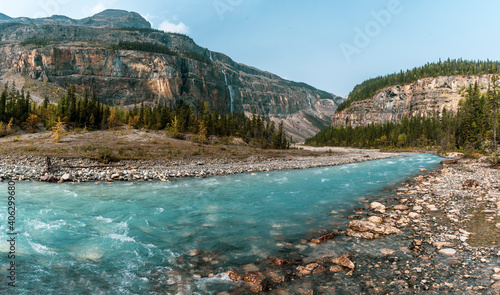 Turquoise river with an amazing mountains