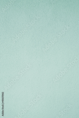 Vertical green mint concrete stone surface paint wall background, Grunge cement paint texture backdrop, Green rough concrete stone wall background, Copy space background, banner, wallpaper