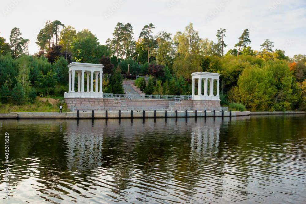 Pier on the Moscow River, park area in the autumn season, Strogino, Moscow - September 24, 2020