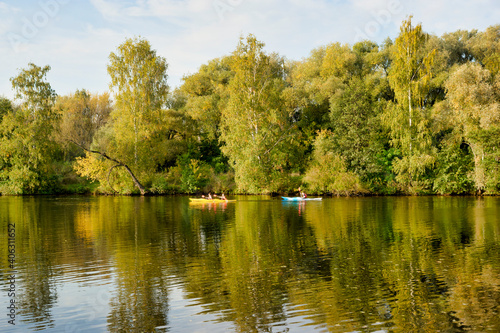 Kayaking on the river. Autumn trees. Park zone in Strogino, Moscow - September 24, 2020