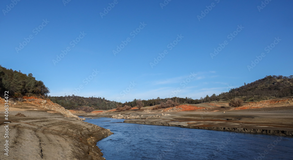 Beautiful Red Rock and Shoreline of the North Fork of the American River at Low Water Below the Folsom Reservoir High Water Line