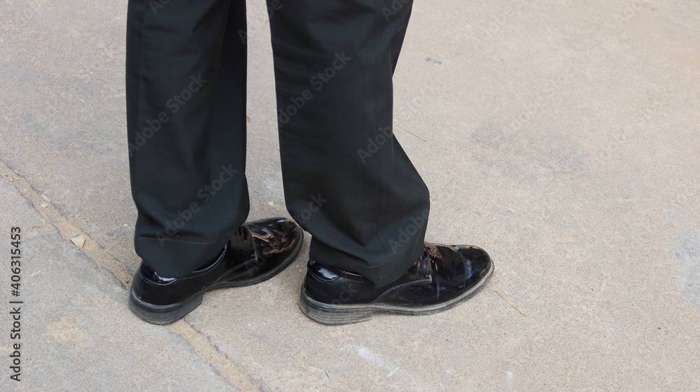 man in black shoes man in black shoes