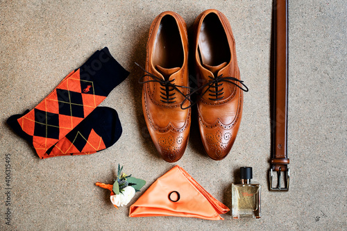 flatlay for pair of shoes and wedding accesories