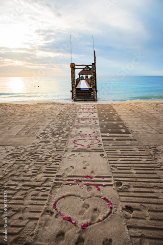 Beach in Mexico with rose hearts