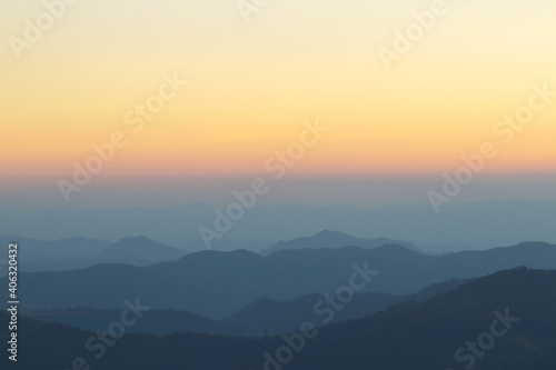 Foggy layered mountain landscape in maehongson province, thailand. © kannika2012