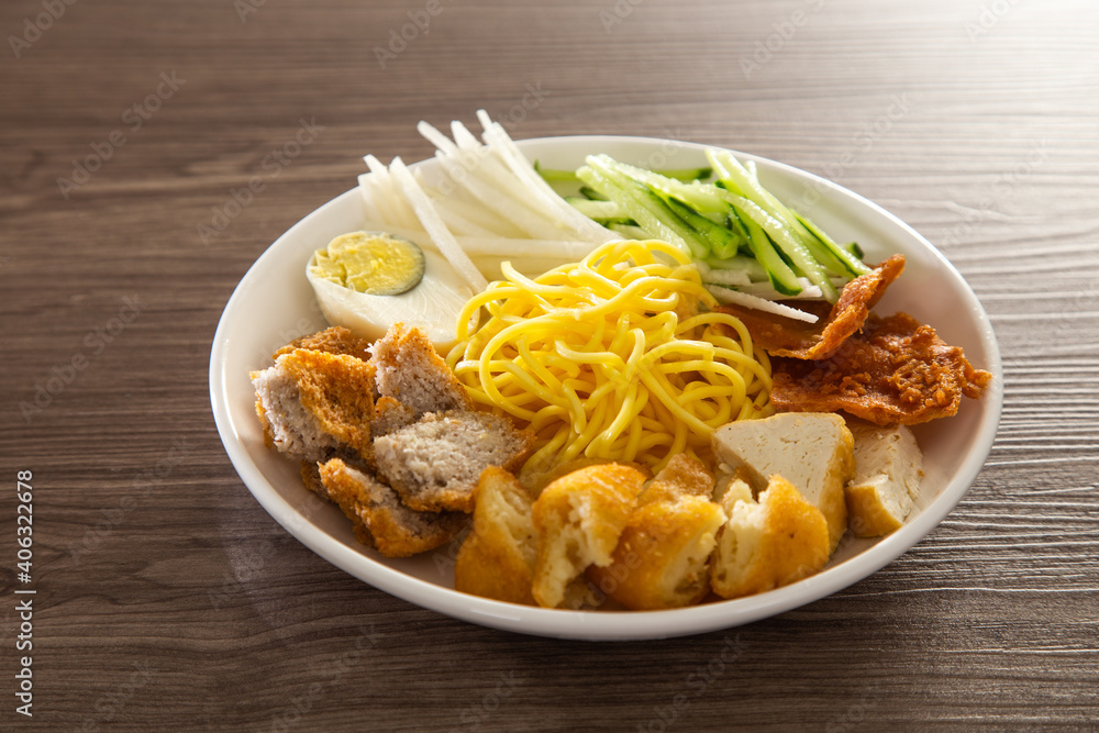 Mee Rojak is Malaysia Indian food of noodle with peanut sauce. Mee Rojak is Malaysia Indian food of noodle with peanut sauce.
