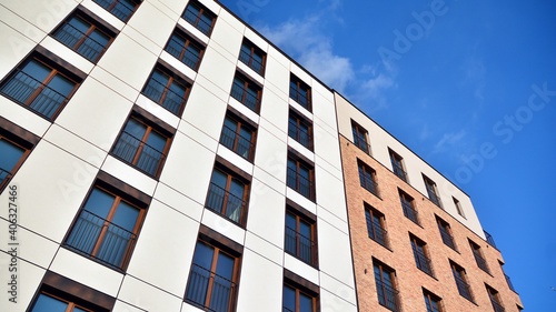 Wallpaper Mural Fragment of modern luxury residential apartment,  home house building concept. Modern apartment building on a sunny day with a blue sky. Torontodigital.ca