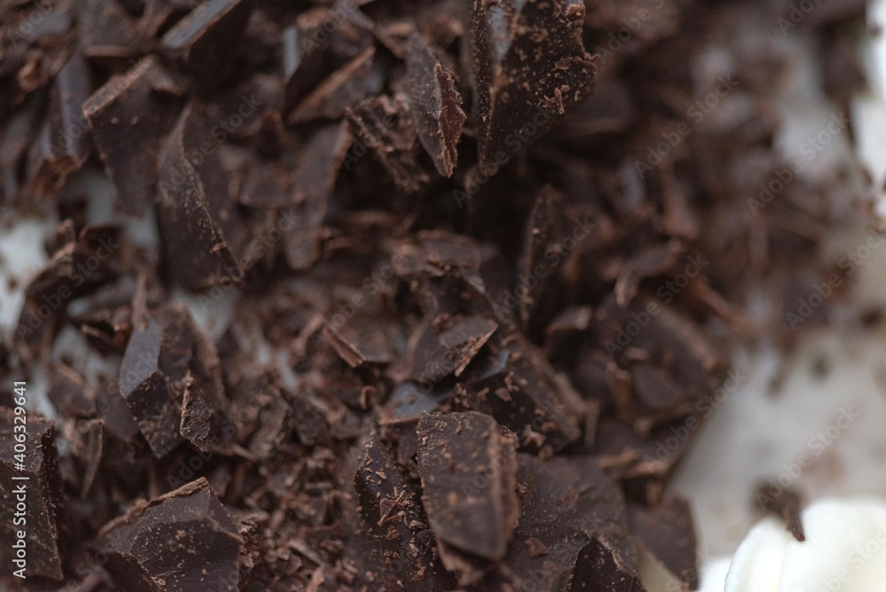 Chocolate sprinkles on the cake close-up. Chocolate sprinkles on the cake close-up.