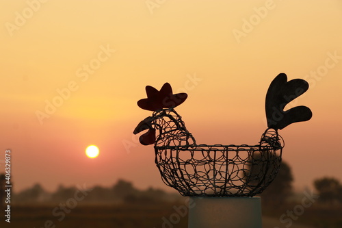 Close up Chicken wire basket on sunrise in the morning