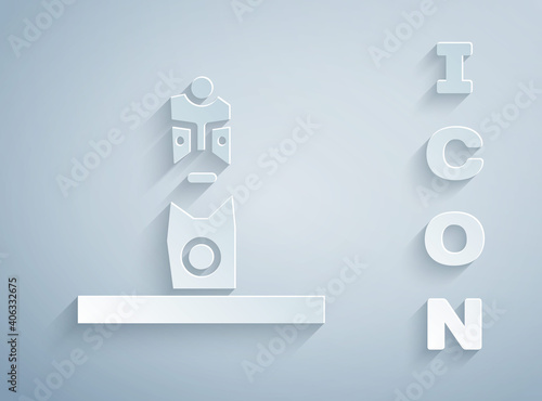 Paper cut Slavic pagan idol icon isolated on grey background. Antique ritual wooden idol. Paper art style. Vector.